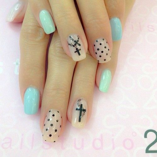 Cross and polkadot nails.