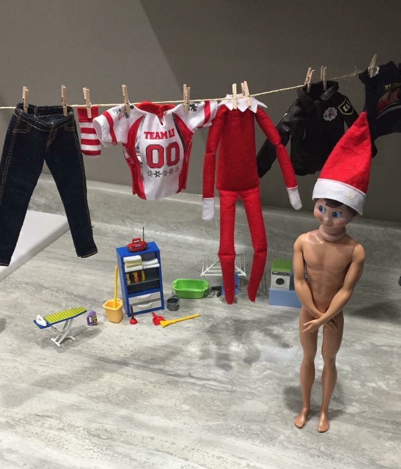 Naked elf on the shelf doing laundry