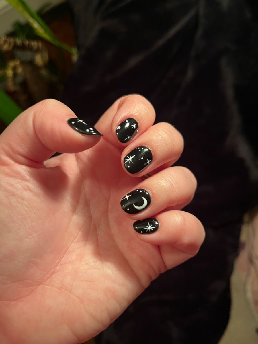 Black magic Halloween nails