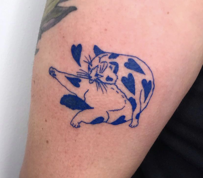 Blue ink cat tattoo