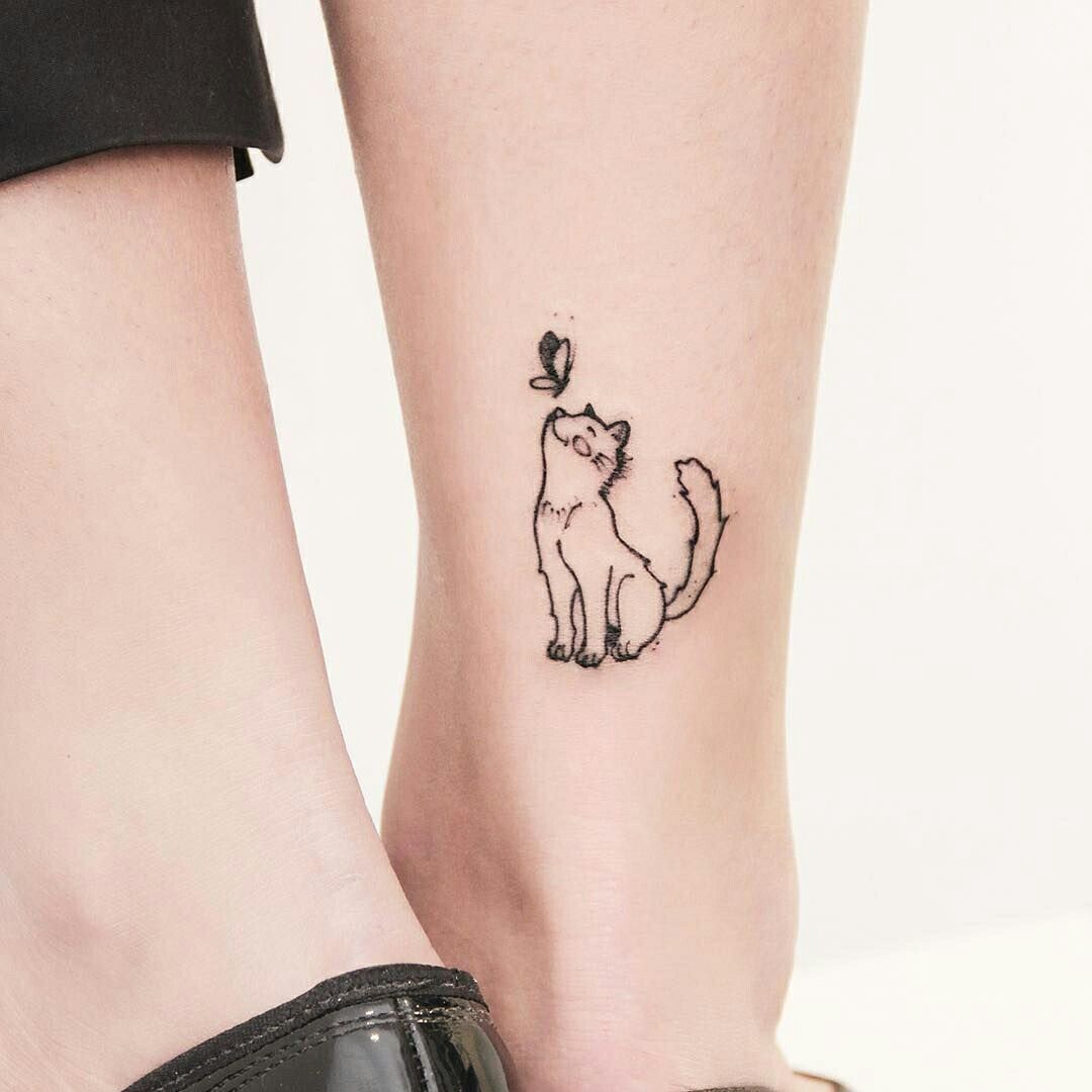 Cat with butterfly tattoo