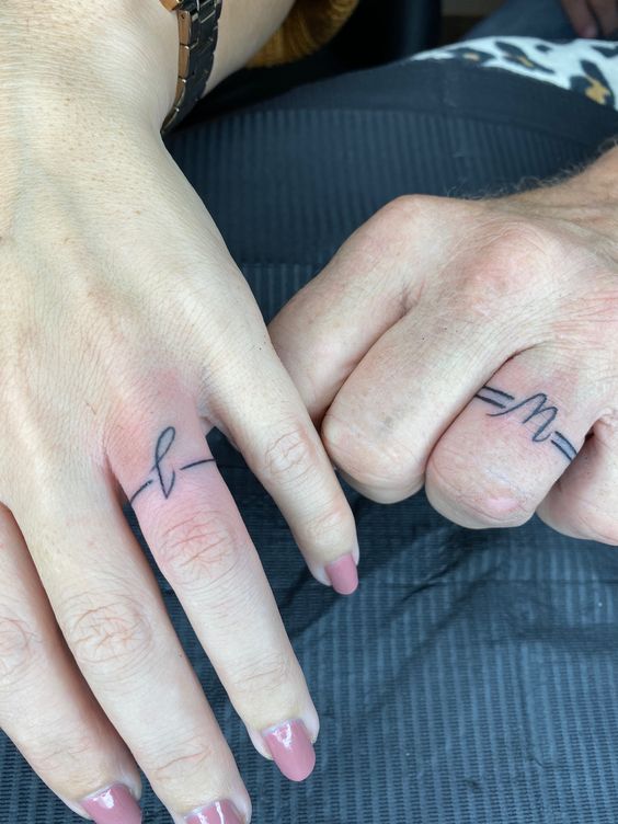 Couple Finger Tattoo