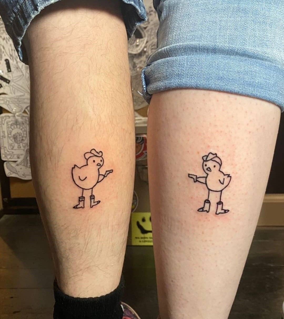 Couples matching tattoos chicken standoff