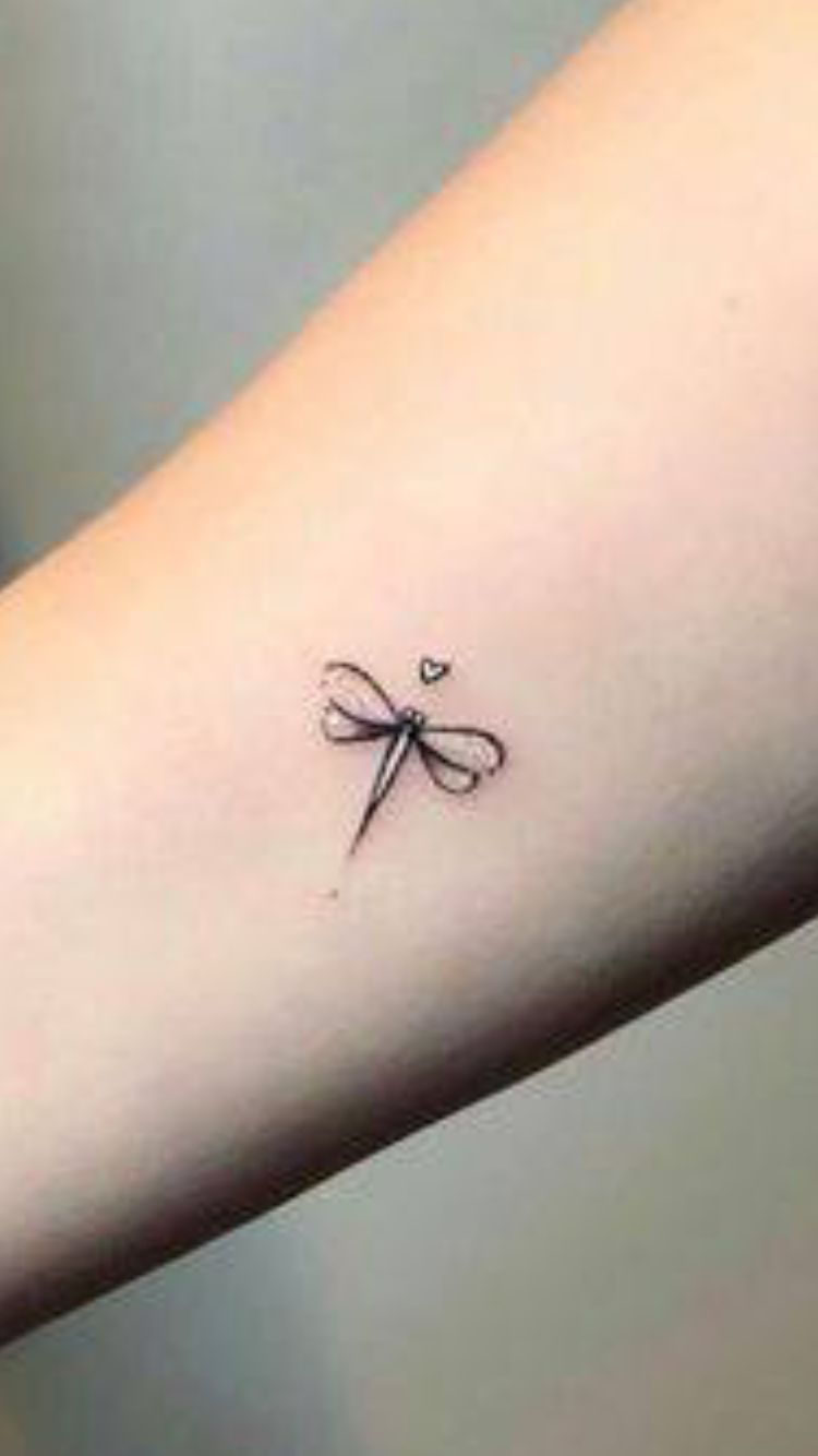 Delicate dragonfly tattoo