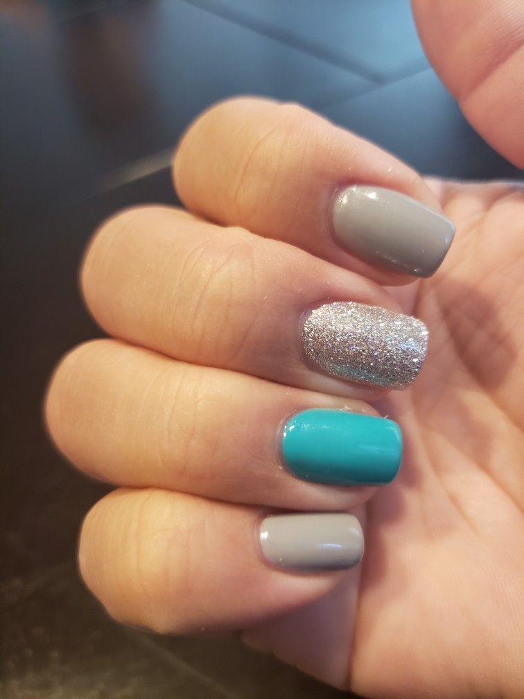 Teal, gray, and silver builder gel nails.