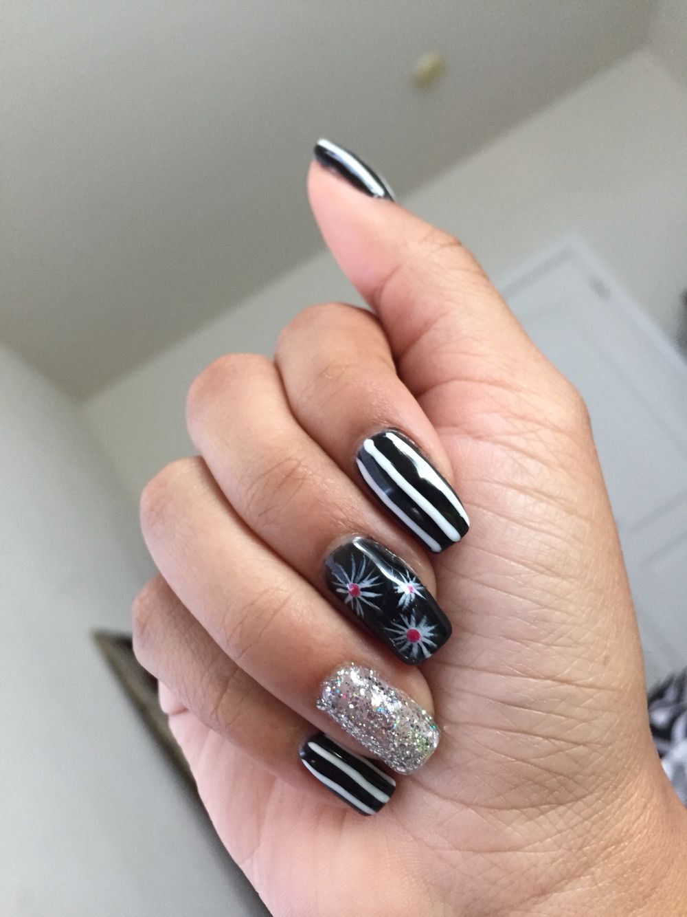 The black and white nails