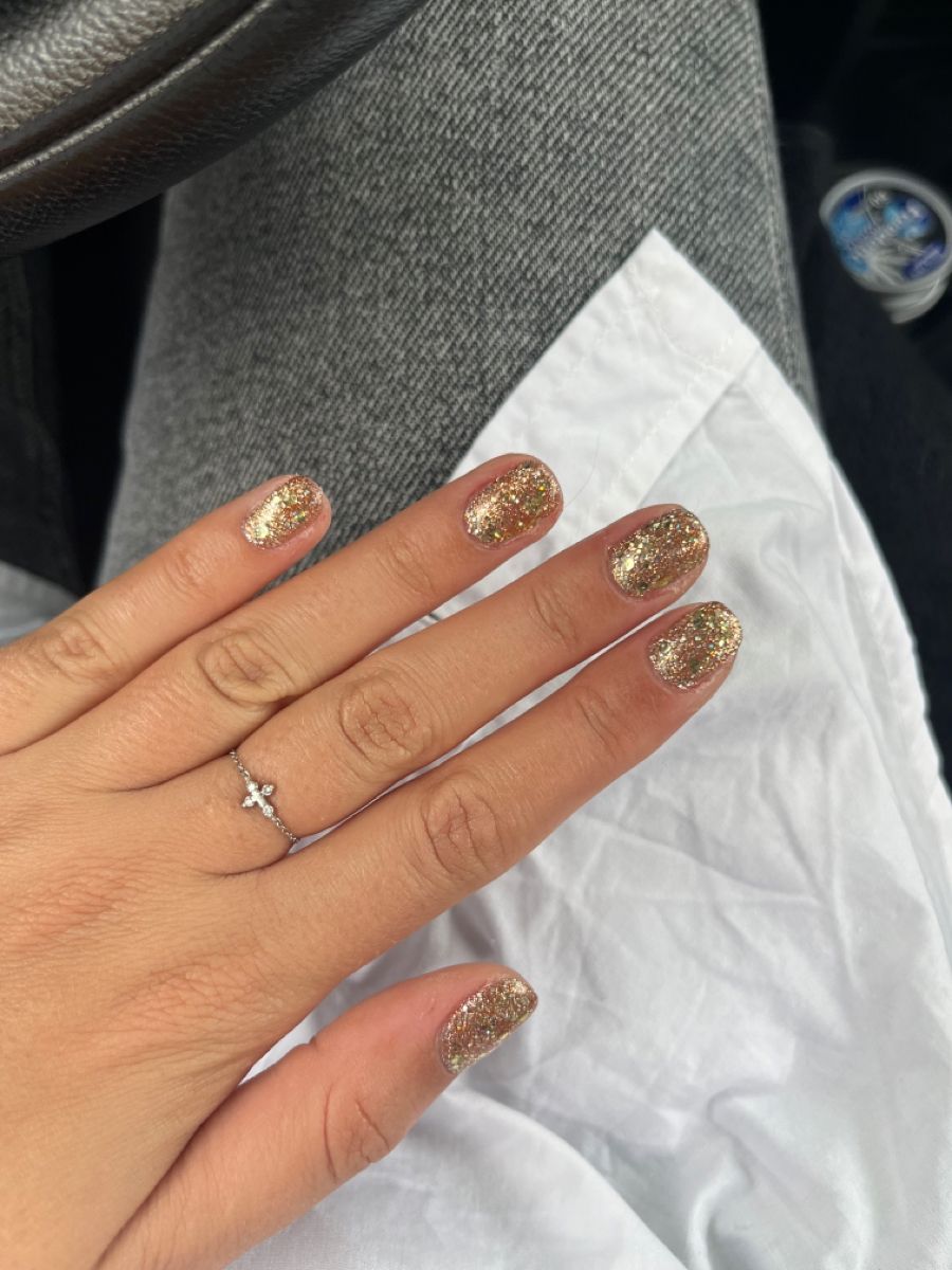 The metallic golden nails