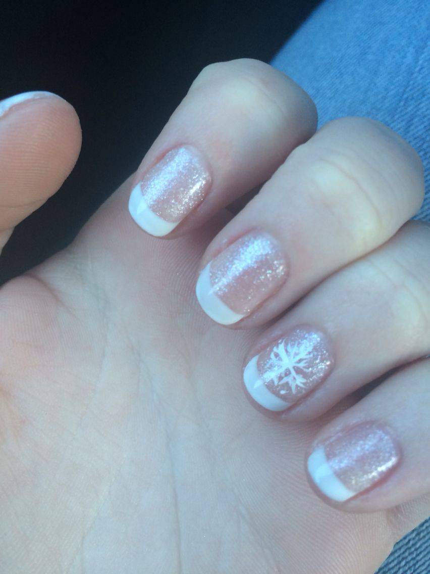 Winter glitter French manicure with snowflake