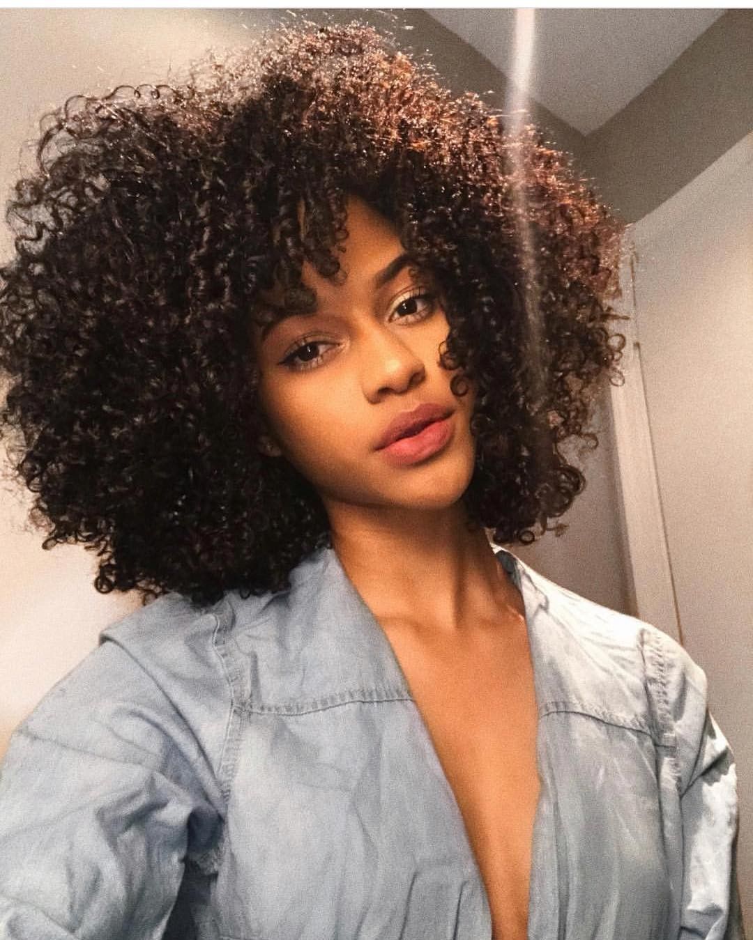 Curly hair with short bangs