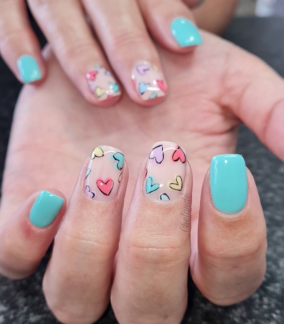 Valentine's nails, turquoise with hearts nail art