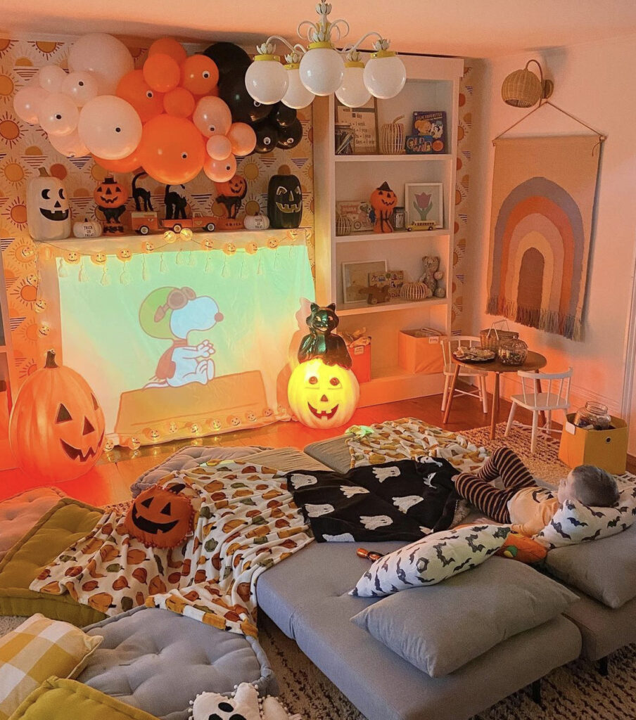 Cozy Kids Halloween Movie Setup with Balloons