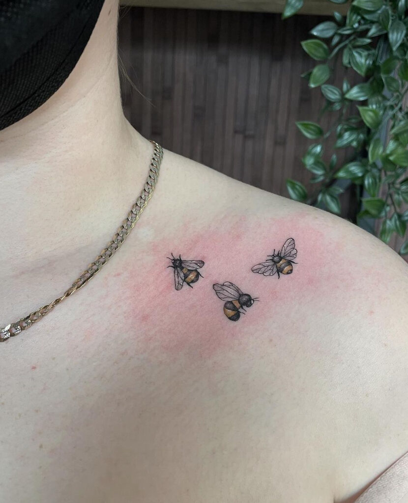 bees collarbone tattoo