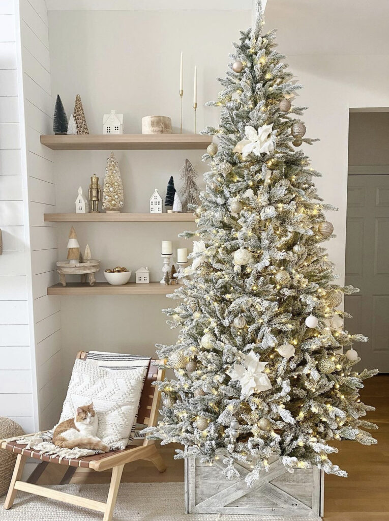 White Flocked Christmas Tree with Minimal Neutral decor