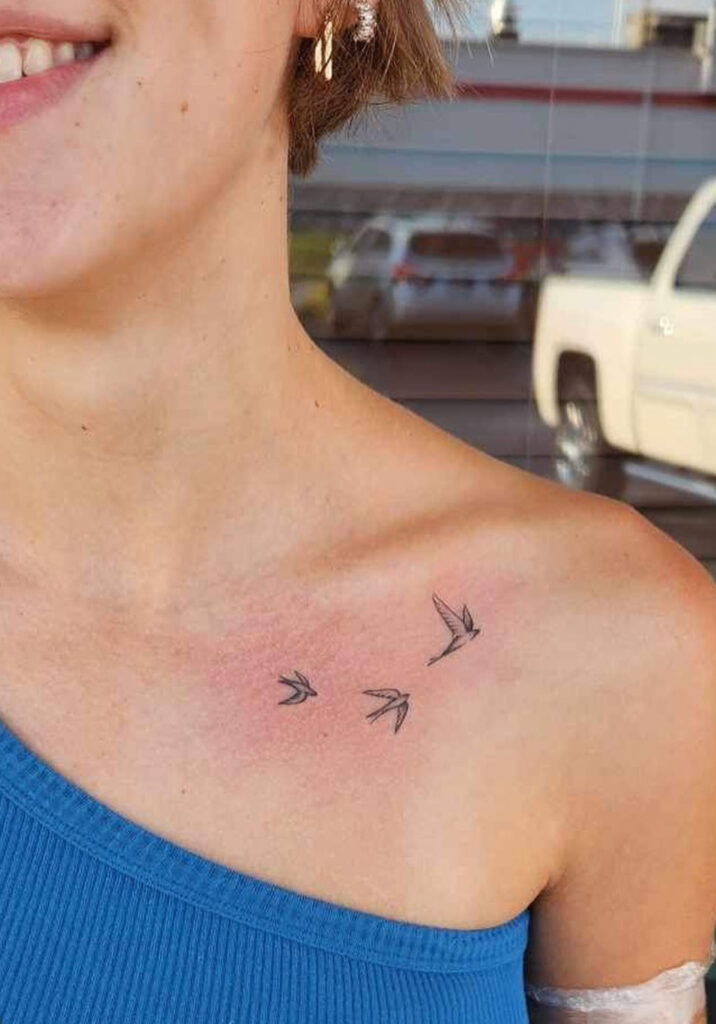 3 small sparrows collarbone tattoo