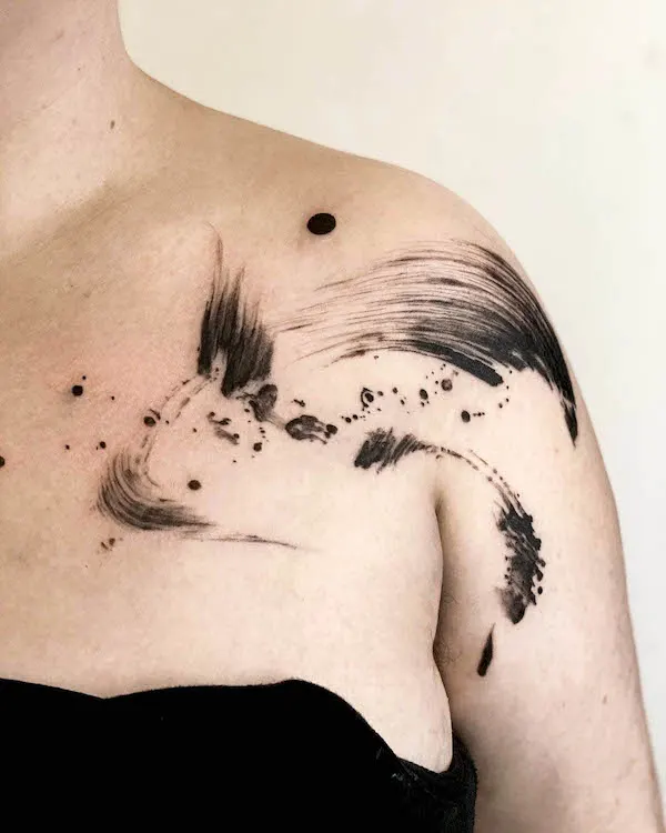 Abstract ink wash stroke tattoo