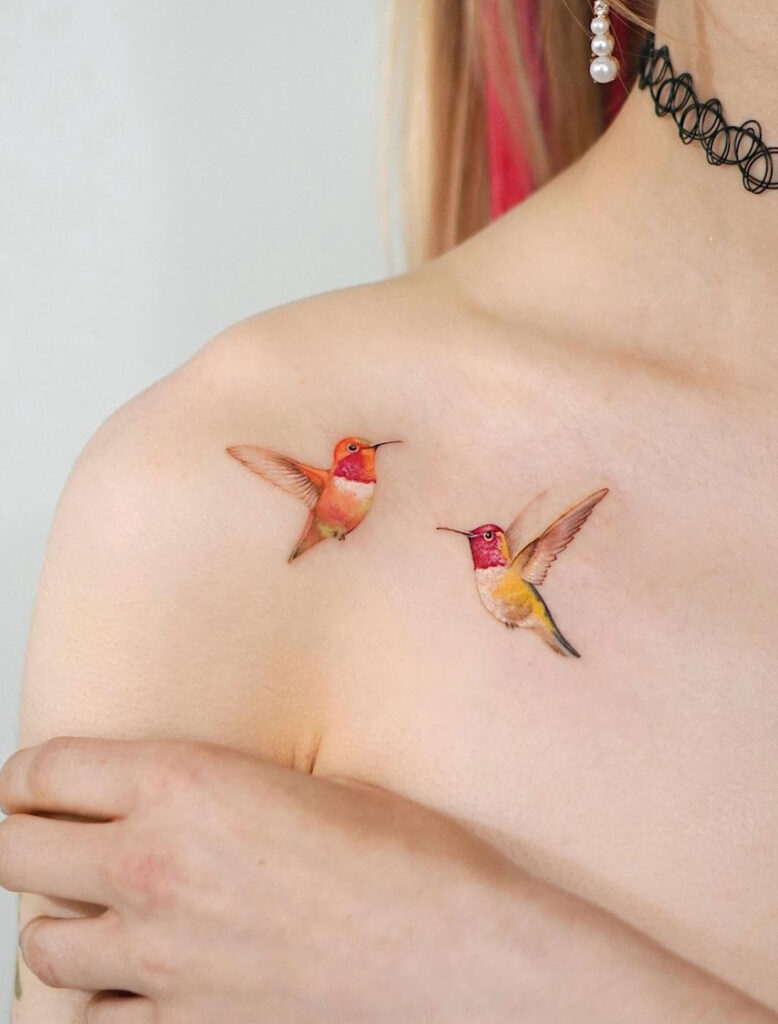 Detailed colorful hummingbird tattoo