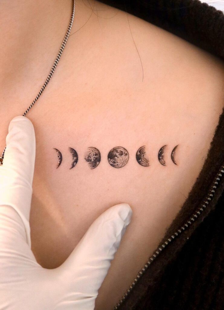 Moon phases collarbone tattoo