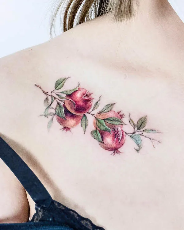 Pomegranate collarbone tattoo