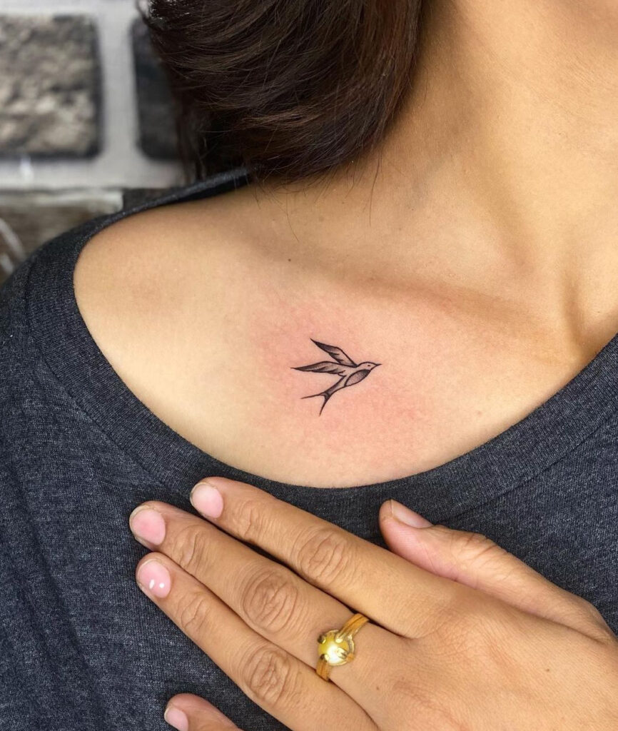 Small sparrow collarbone tattoo