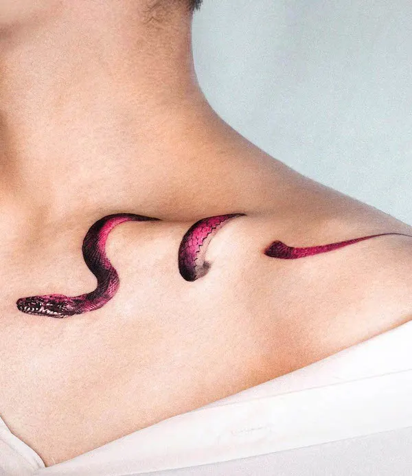 Snake collarbone tattoo